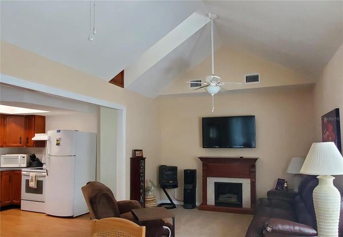 Living Room with High ceiling & Skylights
