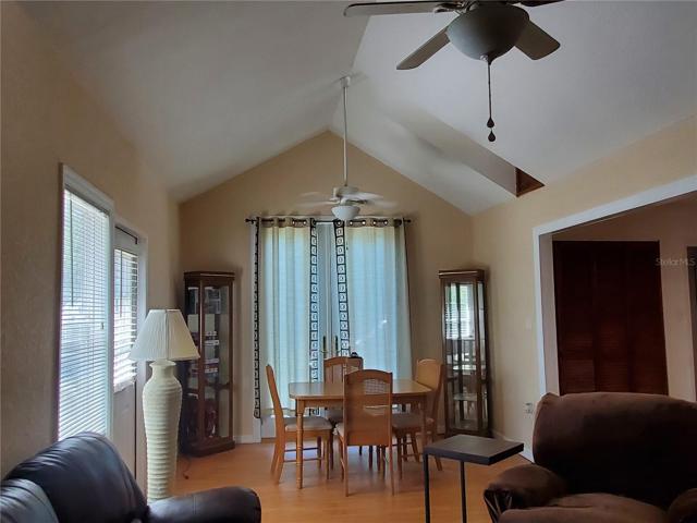 Dining Room with High ceiling & French doors