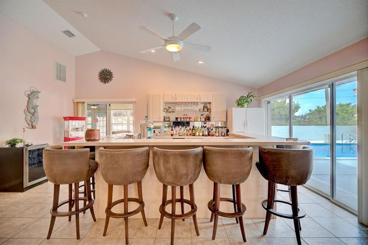 Bar area with view of the pool area