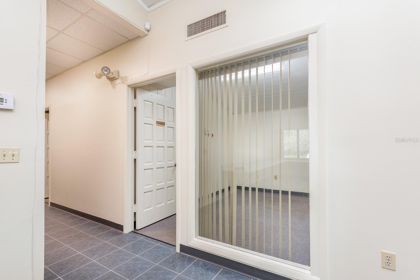 Rear office - window overlooks open work space