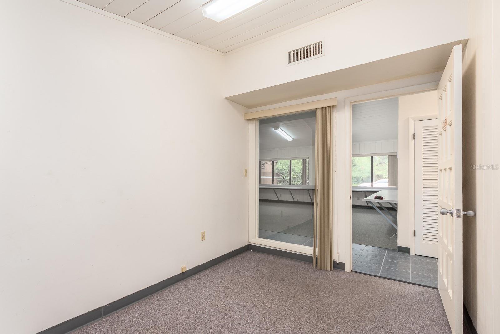 Rear office - window overlooks open work space