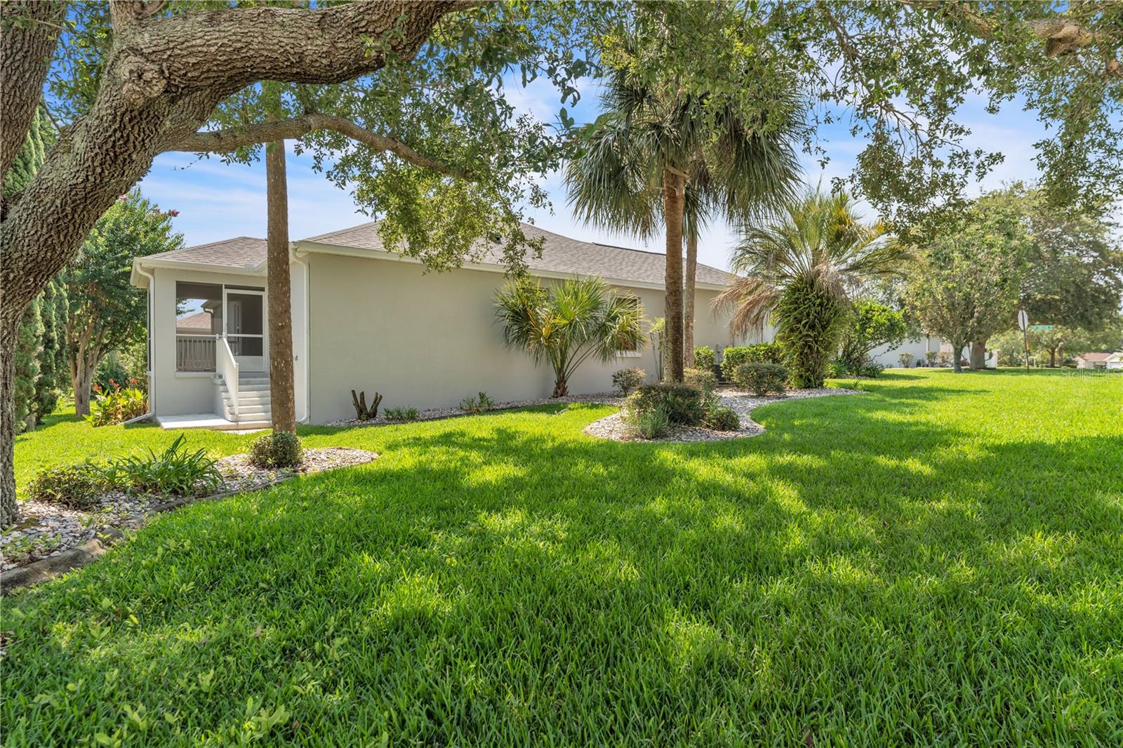 Oversized corner lot with beautiful lush landscaping