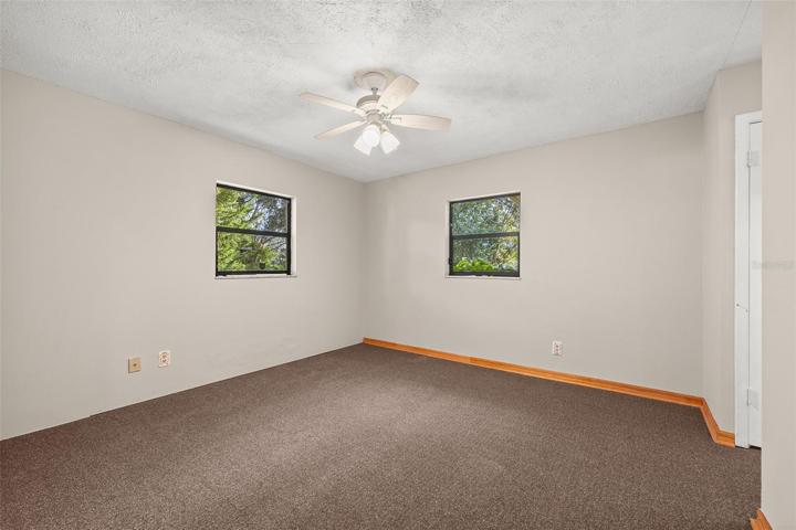 Primary Bedroom (Fresh Paint & Carpet)