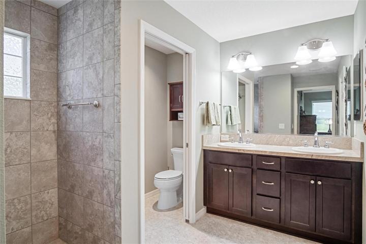 Dual sinks & walk in shower in Master Bath