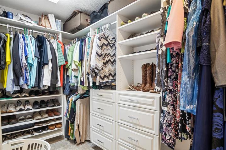 Walk-in closet with closet organizers
