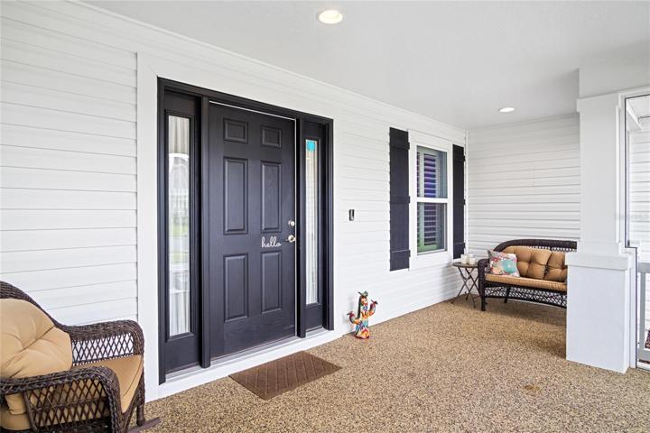 Riverstone flooring on oversized front porch/patio