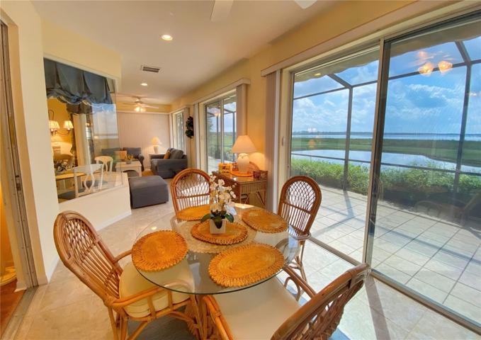 Florida Room overlooks the Birdcage and Golf Course and Water beyond