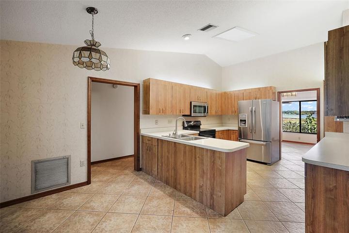 Dinette, with entry to the Master Bedroom, utility and garage