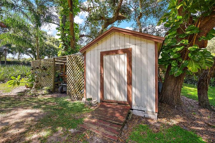 Shed on property, with equipment storage on side