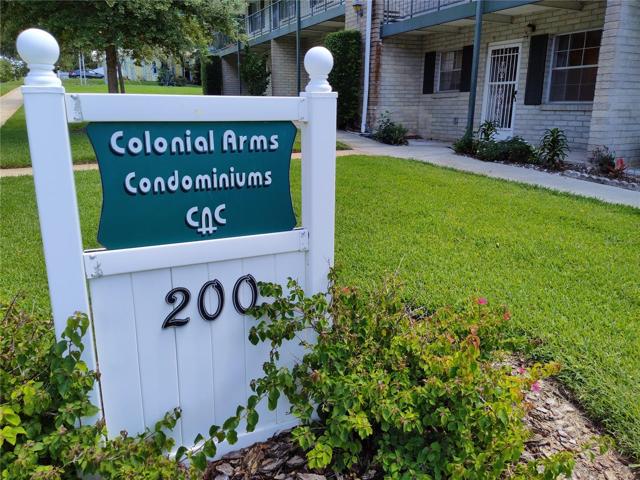 Front of condo (shown to right of community sign)