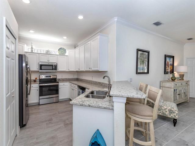 Bright open kitchen and walk-in pantry