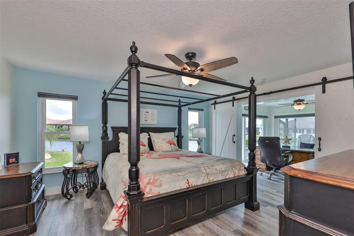 Primary Bedroom with Barn Door Slider to Bonus Room/Office/Den Amazing Water Views