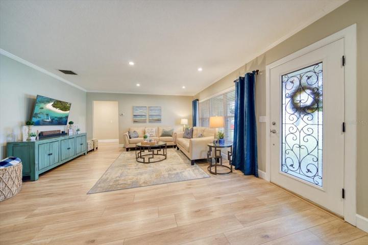 Entrance into this beautifully updated 3 BR 2.5 BA home in Clearwater with a view of the large living room