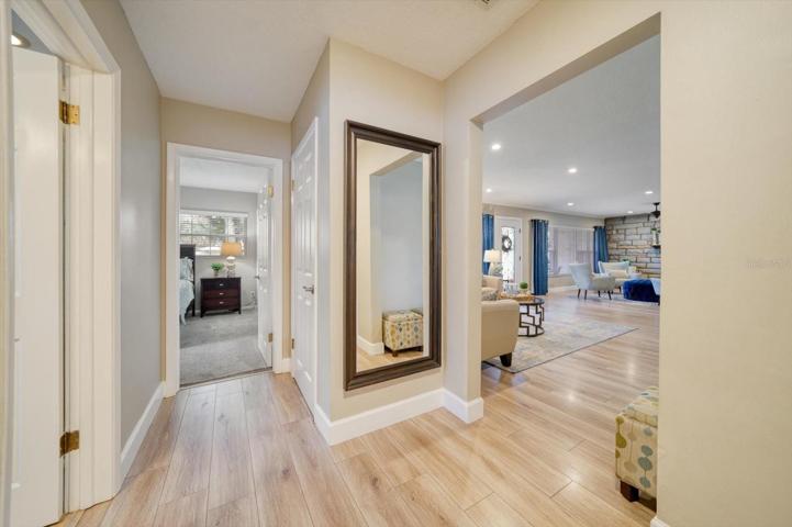 Hallway to the three bedrooms