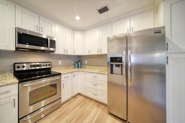 Updated kitchen with stainless steel appliances