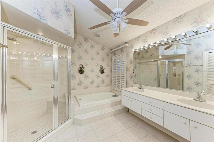 Master Bath has walk-in Shower, dual sinks