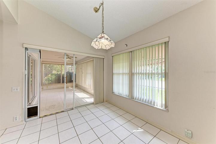 Dining Room opens to Florida Room