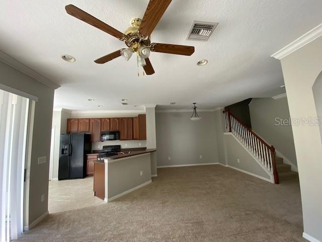 View of kitchen, Living, Dining and stairway