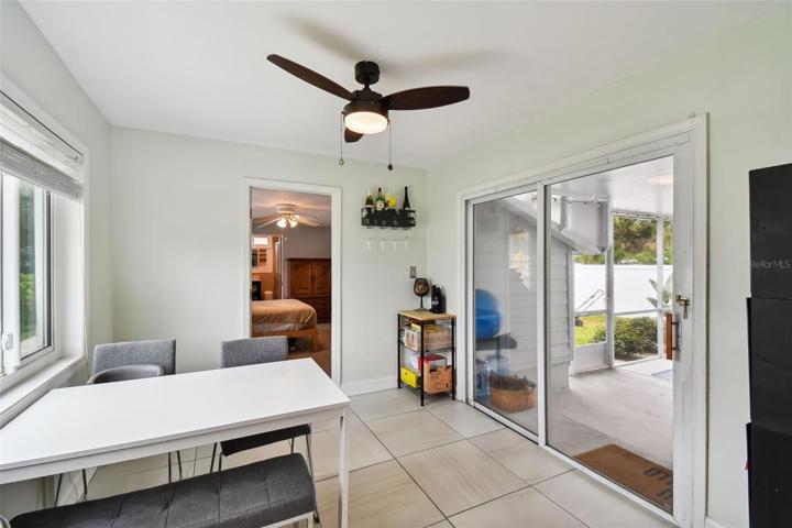 Dining area doors lead out to the screened in porch