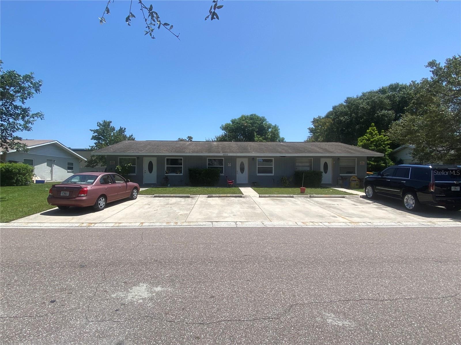 Triplex- 2 bed, 1 bath units with inside laundry