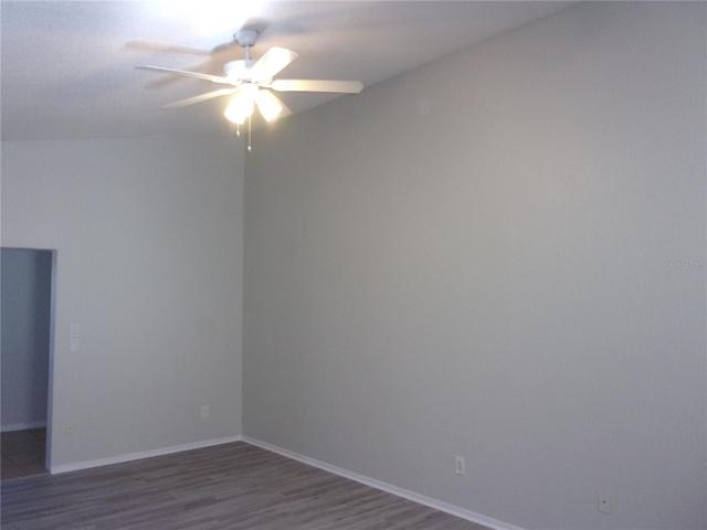 Living room with vaulted ceiling