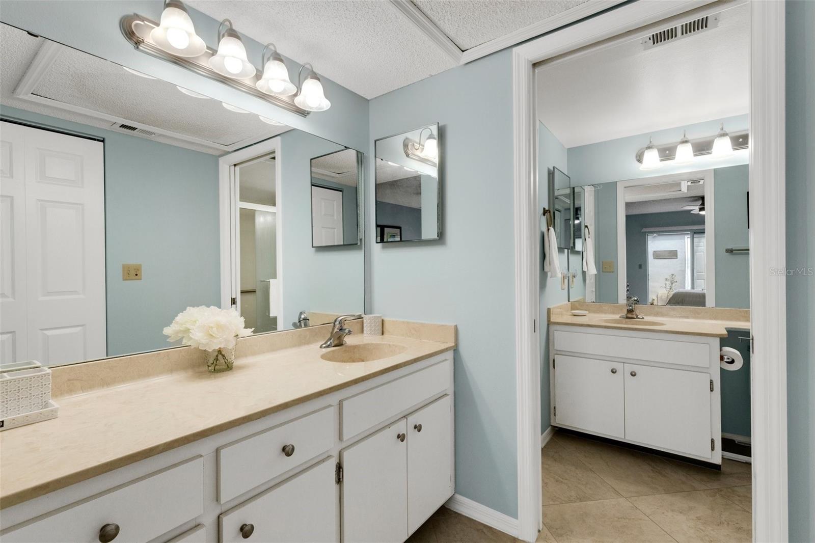 MASTER BATH FIRST VANITY WITH POCKET DOOR TO SECOND VANITY