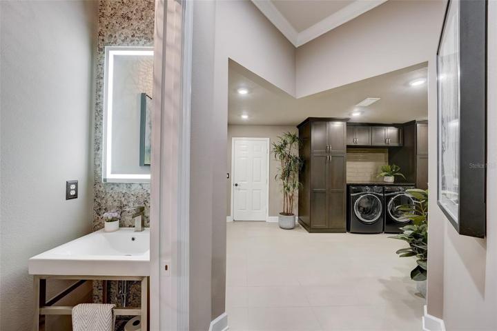 1/2 bath left/laundry room