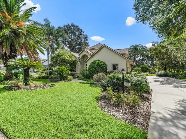 Large driveway leading to home