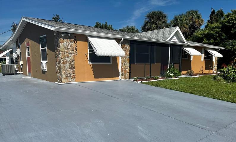 Side driveway and patio area.
