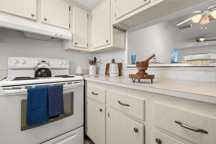 Kitchen with pass through window/ bar area