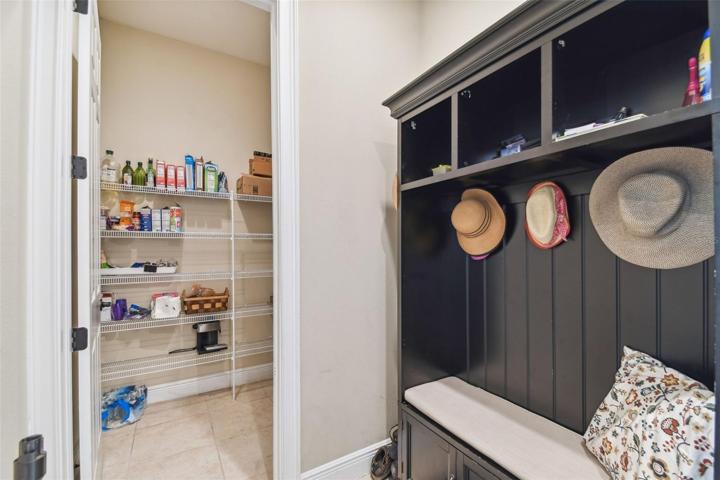 Mud room, extra large pantry off of the kitchen and garage entry