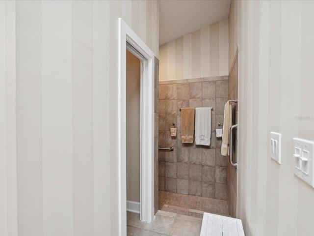 Walk in shower with private toilet area