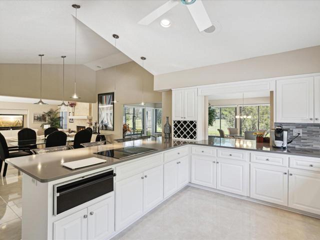 OPEN CONCEPT Kitchen overlooking the  dining area, great room and living room