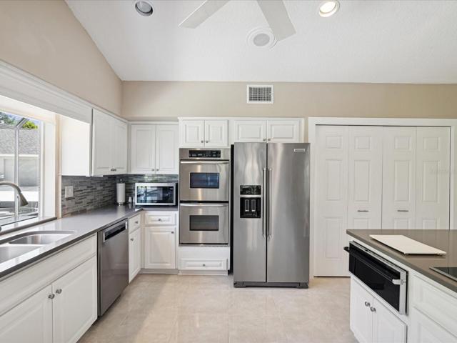 Spacious Pantry with pull out drawers, SS appliances with Thermador Warmer