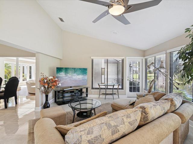 Very spacious Living Room which has amazing views of the pond and fairway #2 of the golf course.
