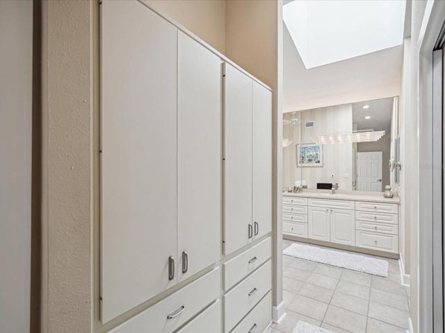 More closet space leading into your en suite bathroom