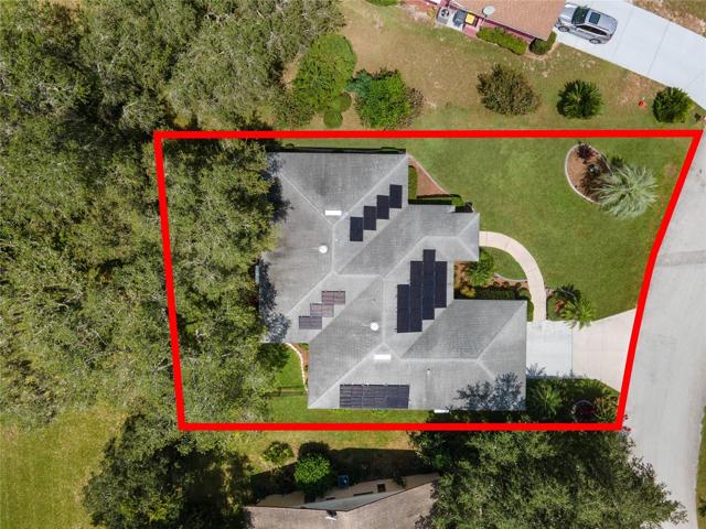 Additional Energy efficient features include additional insulation in the attic, an attic fan & a insulated garage door