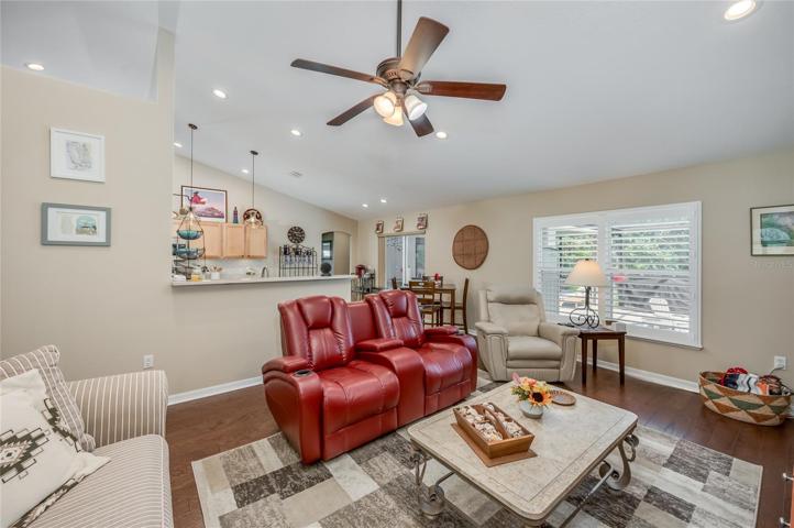Family room with kitchen and breakfast nook in background