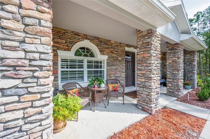 Huge and gorgeous columned front porch!