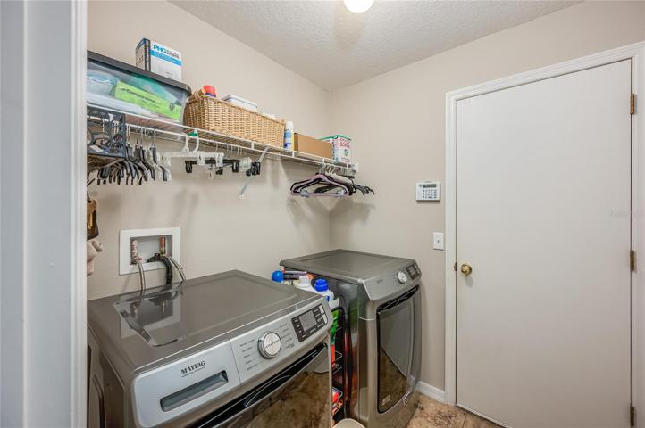 Laundry room with new washer and dryer!