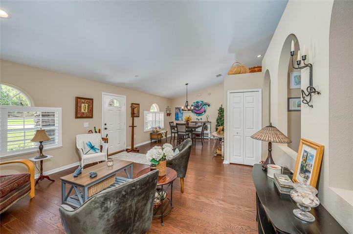 Living and dining rooms from primary suite doorway