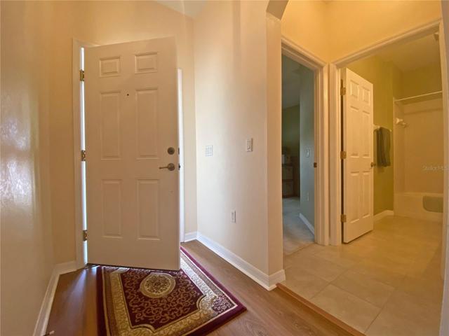 Front Entry. Guest Bathroom/Guest Bedroom
