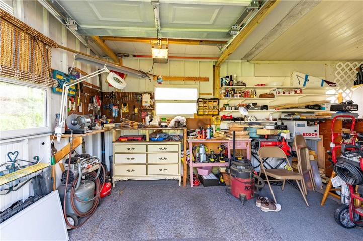 Workshop in golf cart shed.