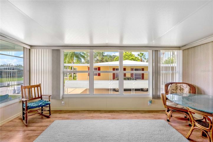 Florida room is off living and dining area.