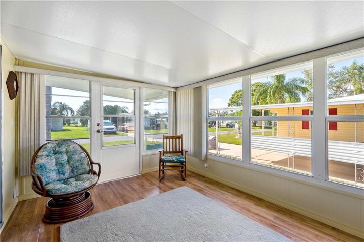 Exit Florida room to front covered patio.