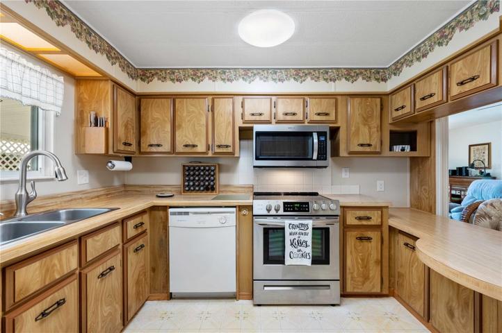 Stainless steel range and microwave.