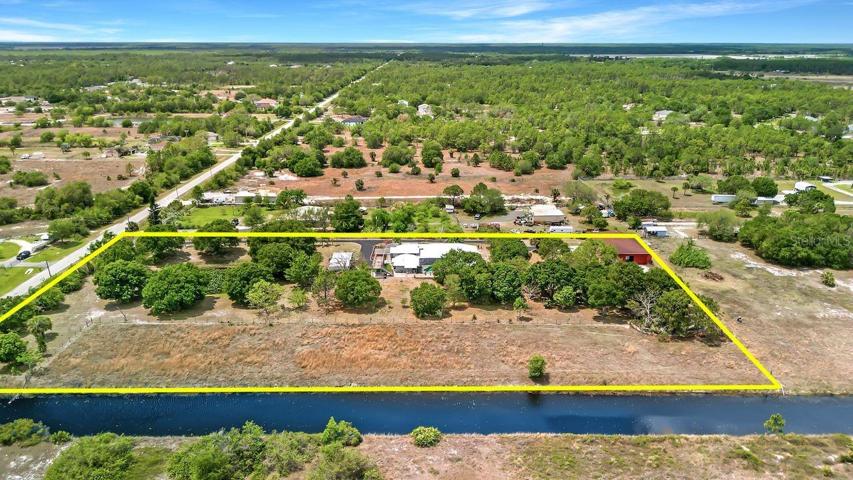 ariel view from east property line extends halfway across canal