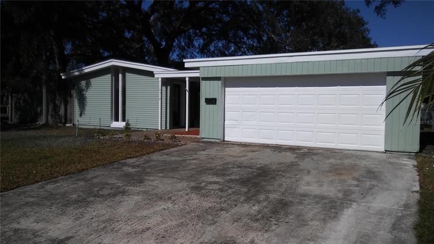 Exterior facing 2 car garage and driveway