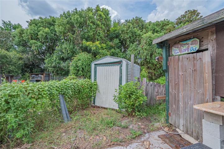 CARPORT ON RIGHT, SHED ON LEFT