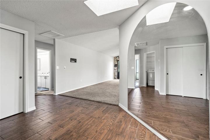 Elegant Foyer with Skylight